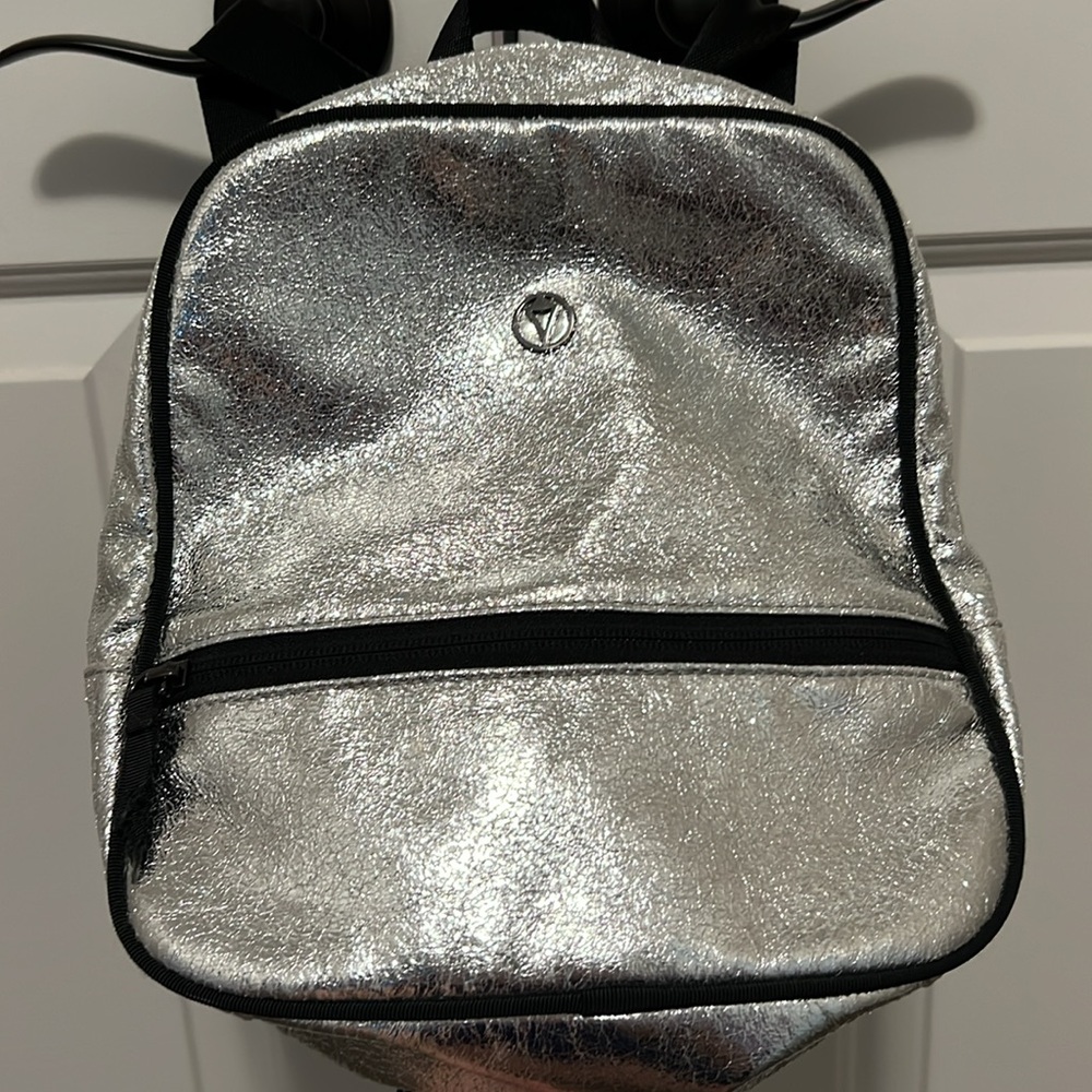 Gorgeous silver IVIVVA backpack.